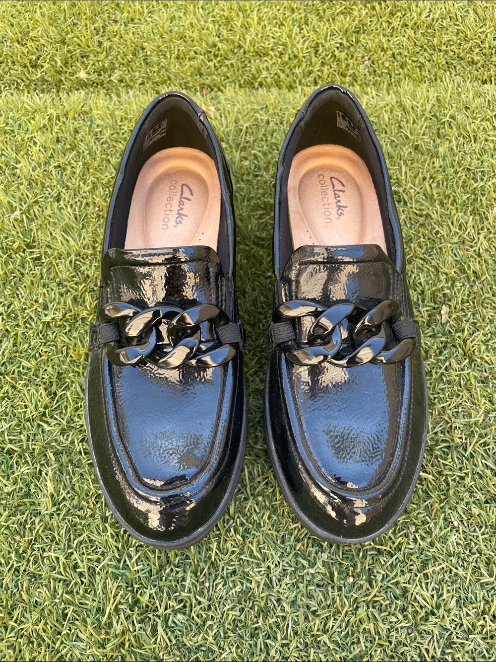 Clarks Zylah Black Patent Slip-On Loafers with Chain Accent